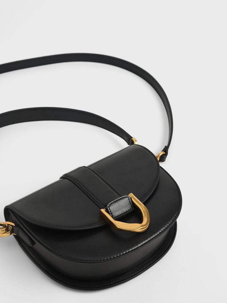 Charles & Keith Gabine Saddle Bag in Medium Black (Category: Shoulder Bags) located in Baguio. Submitted by azirez9 (Listing ID 1431785942, Image 2). Description: last price! got it around sept 2025 from: @lushpicks on ig rfs: decluttering my bags courier: jnt or lbc loc: baguio.