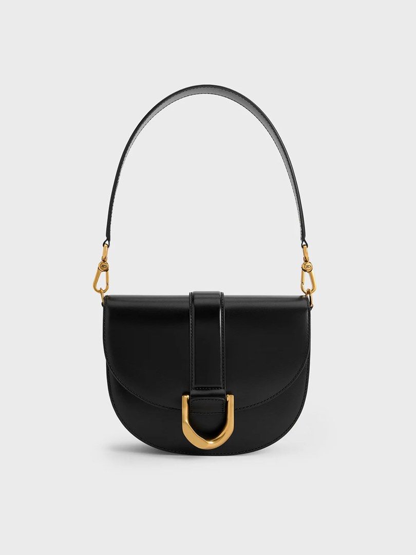 Charles & Keith Gabine Saddle Bag in Medium Black (Category: Shoulder Bags) located in Baguio. Submitted by azirez9 (Listing ID 1431785942, Image 1). Description: last price! got it around sept 2025 from: @lushpicks on ig rfs: decluttering my bags courier: jnt or lbc loc: baguio.