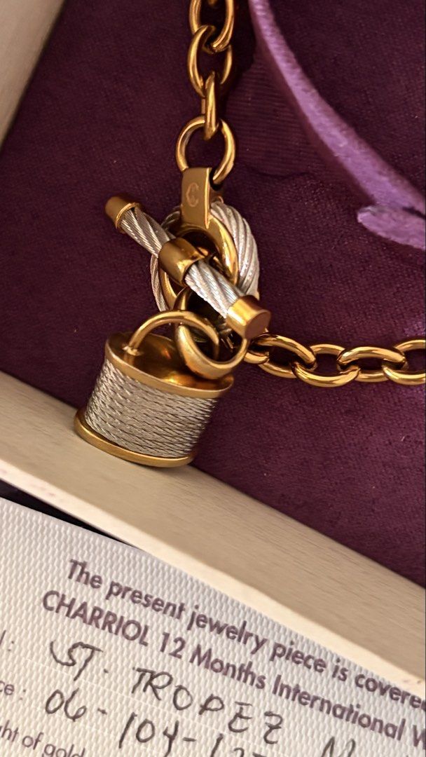Charriol St. Tropez Mariner Bracelet (Category: Bracelets) located in Mandaluyong City. Submitted by prelovedcole (Listing ID 1431575733, Image 3). Description: - Authentic Charriol St. Tropez Mariner bracelet - Gold chain with purple leather strap - Features lock charm and T-bar closure - Includes original box, warranty card, and papers, and Paperbag Bought at Charriol Gh mall Retails around 20k .