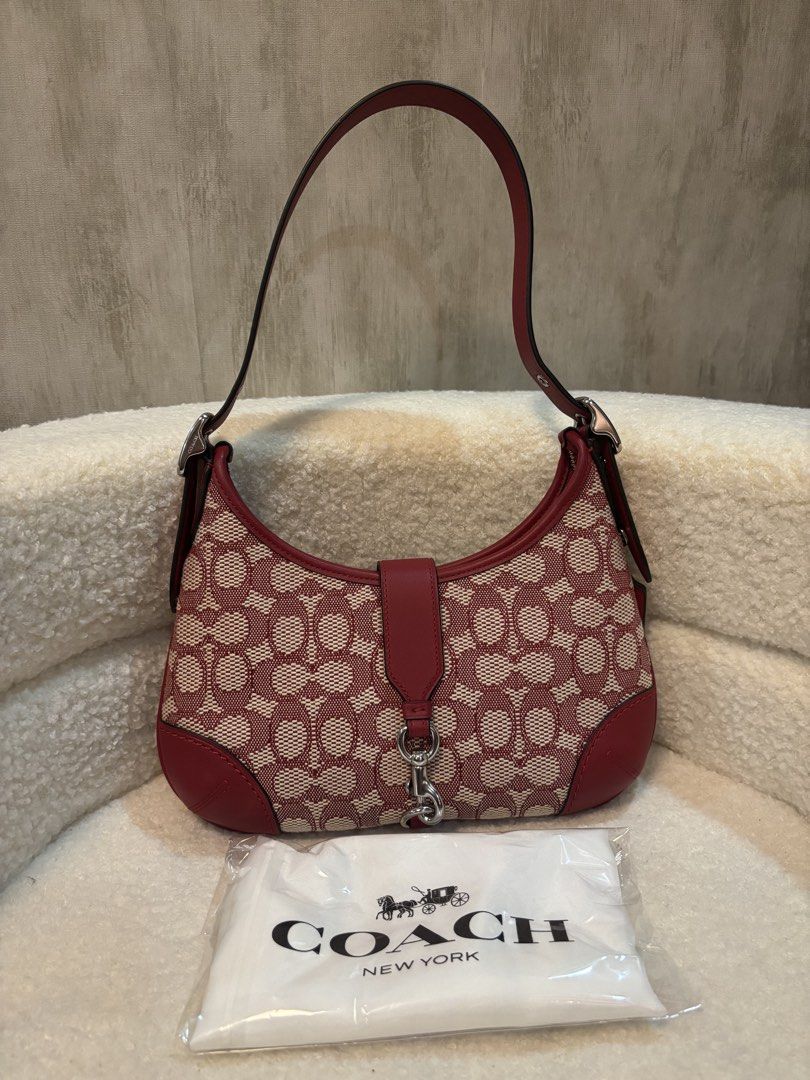 Coach Hampton Hobo Shoulder Bag (Category: Luxury Bags & Wallets) located in Manila. Submitted by _thepursela (Listing ID 1431716008, Image 1). Description: - Coach Hampton Hobo shoulder bag - Color: Red and beige - Features signature Coach pattern - Top handle - Flap closure with silver-tone clasp - Includes dust bag and hang tags - Interior zip closure - Leather tag with Coach logo - Limited re-edition 2003.