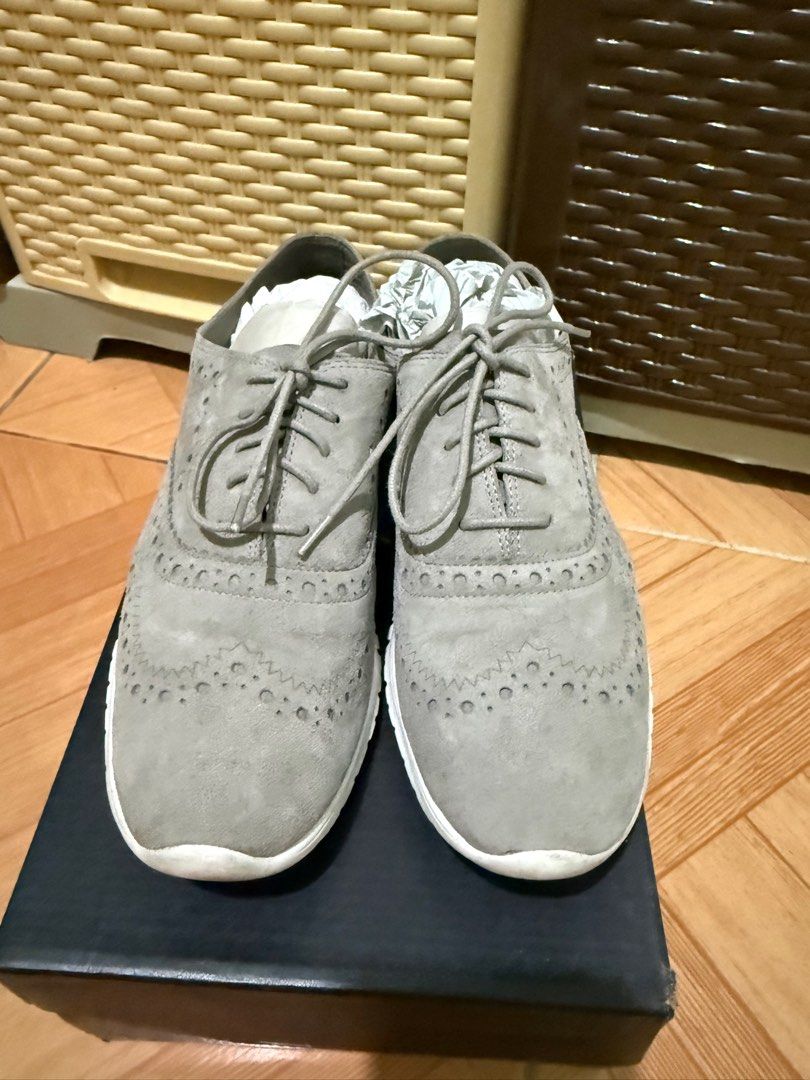 Cole Haan Zerogrand Wngox CII (Category: Sneakers) located in Antipolo. Submitted by epicpenguin-3c070e (Listing ID 1431764324, Image 2). Description: - Cole Haan Zerogrand Wingox CII - Color: Ironstone (Gray) - Size: 8B - Classic wingtip design - Gray suede upper - White soles - Perforated detailing - Original box included.