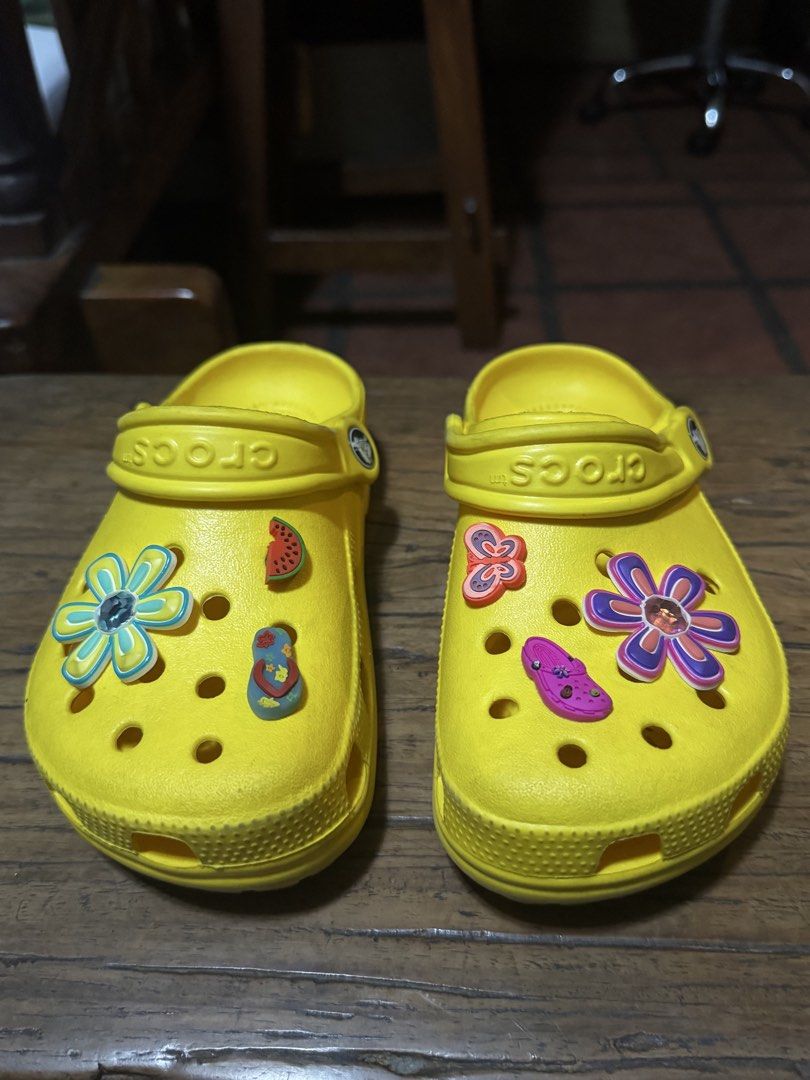 Crocs Classic Clogs Yellow with Jibbitz - Size M3/W5 (Category: Slippers and slides) located in Quezon City. Submitted by limebasil (Listing ID 1431738461, Image 1). Description: M3/W5.