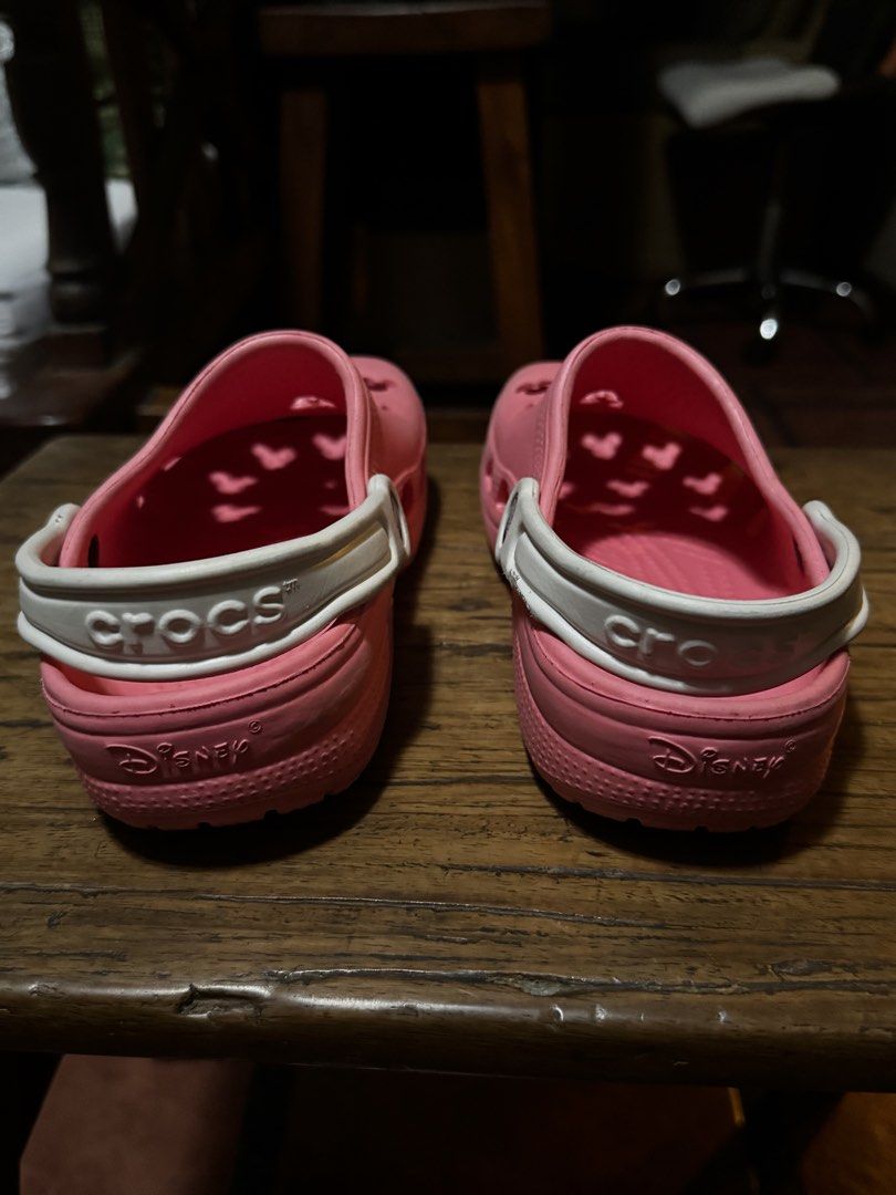 Crocs Disney Minnie Mouse Clogs - Size M3 /W5 (Category: Babies & Kids Fashion) located in Quezon City. Submitted by limebasil (Listing ID 1431738077, Image 3). Description: - Pink Crocs clogs - Adorned with a Minnie Mouse charm - White strap - Size: M3/W5 - Features Mickey Mouse-shaped holes - Crocs logo visible - Made in China.