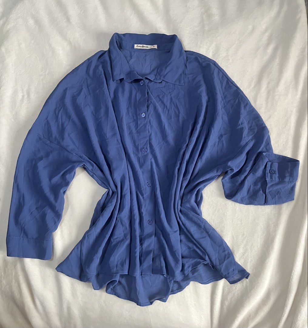 Cutie Blonde Blue Blouse Longsleeves (Category: Blouses) located in Mandaluyong City. Submitted by mandmclosey_ (Listing ID 1431659019, Image 1). Description: - Cutie Blonde blue blouse - Collared neckline - Button-down closure - Long sleeves with buttoned cuffs - Measurements: - Length: 25 inches - Width: 26 inches - Sleeves: 14 inches - Lightweight material - Suitable for casual and semi-formal occasions Loc: Mandaluyong City Mode of payment: G