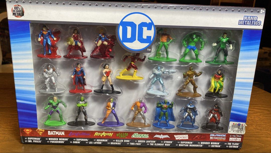 DC Nano Metalfigs 20-Pack (Category: Figurines & Statues) located in Quezon City. Submitted by gab_tan (Listing ID 1431607789, Image 1). Description: - DC Nano Metalfigs 20-pack - Features iconic DC characters like Superman, Batman, Wonder Woman, and The Flash - Made of durable die-cast metal - Packaging displays included characters - Back of box shows other figures in the collection.