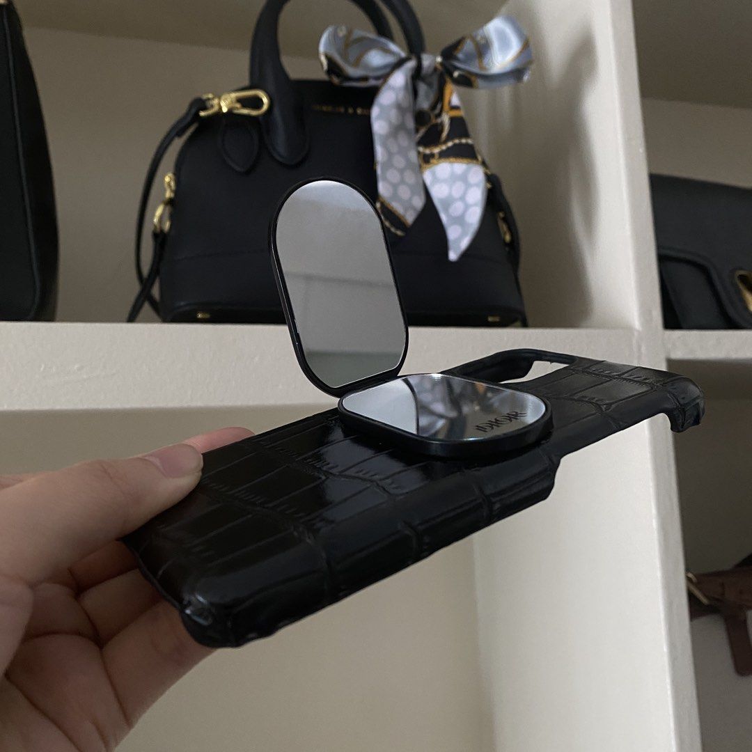 Dior Mirror Phone Stand and iPhone 11 Pro Leather Case (Category: Cases & Sleeves) located in Manila. Submitted by pippintook (Listing ID 1431584435, Image 2). Description: - Really free - iPhone 11 pro leather case is free too. - I haven’t tried detaching mirror from case, but it looks like kaya naman then reapply double sided tape nalang if want ilipat to another phone case. - Not sure if can be fixed, but minor flaw can be seen in last picture