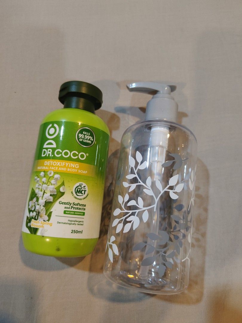 Dr. Coco Detoxifying Soap and Empty Dispenser (Category: Bath) located in Pasig City. Submitted by sanini123 (Listing ID 1431740347, Image 1). Description: NOTE: I got this sometime ago but didn't end up using it. - Dr. Coco Detoxifying Natural Face and Body Soap (250ml) - Includes an empty dispenser with a decorative leaf pattern - Soap gently softens and protects skin.