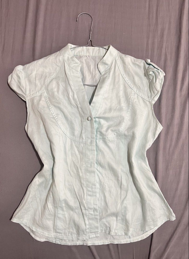 Fitted Sleeveless Blouse (Category: Blouses) located in Quezon City. Submitted by arktx (Listing ID 1431695470, Image 1). Description: - Good condition but need wash - Xs to S - Light blue/light teal ang color.