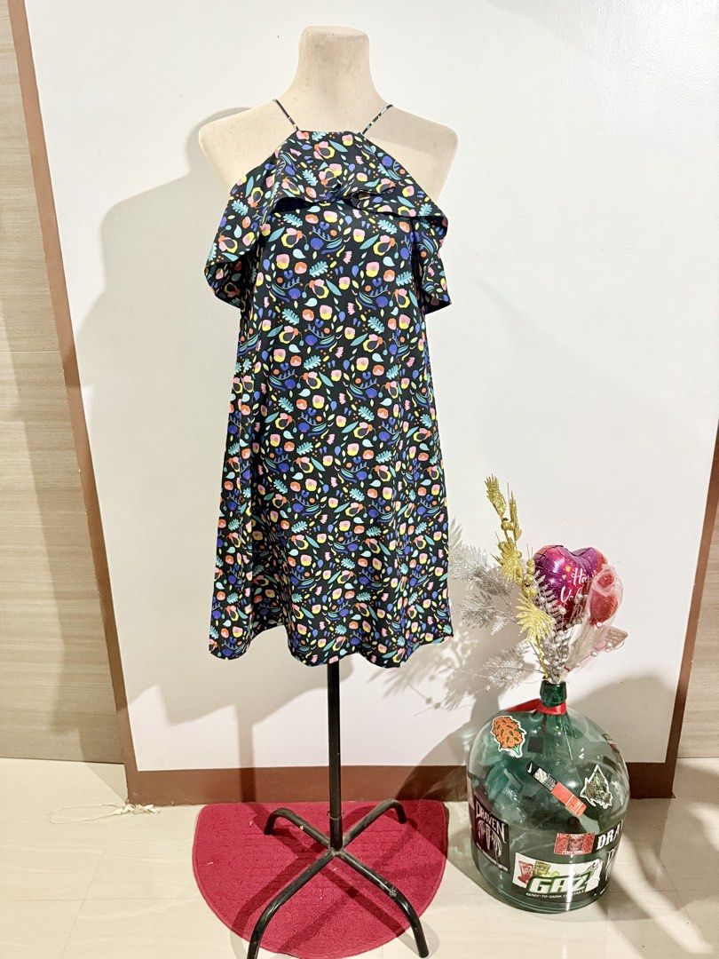 Floral Halter Dress (Category: Dresses) located in Caloocan City. Submitted by dddddddddddeclutter (Listing ID 1431757992, Image 1). Description: - Halter neckline - Vibrant floral print - Ruffled neckline detail - Flowy silhouette - Comfortable and stylish.
