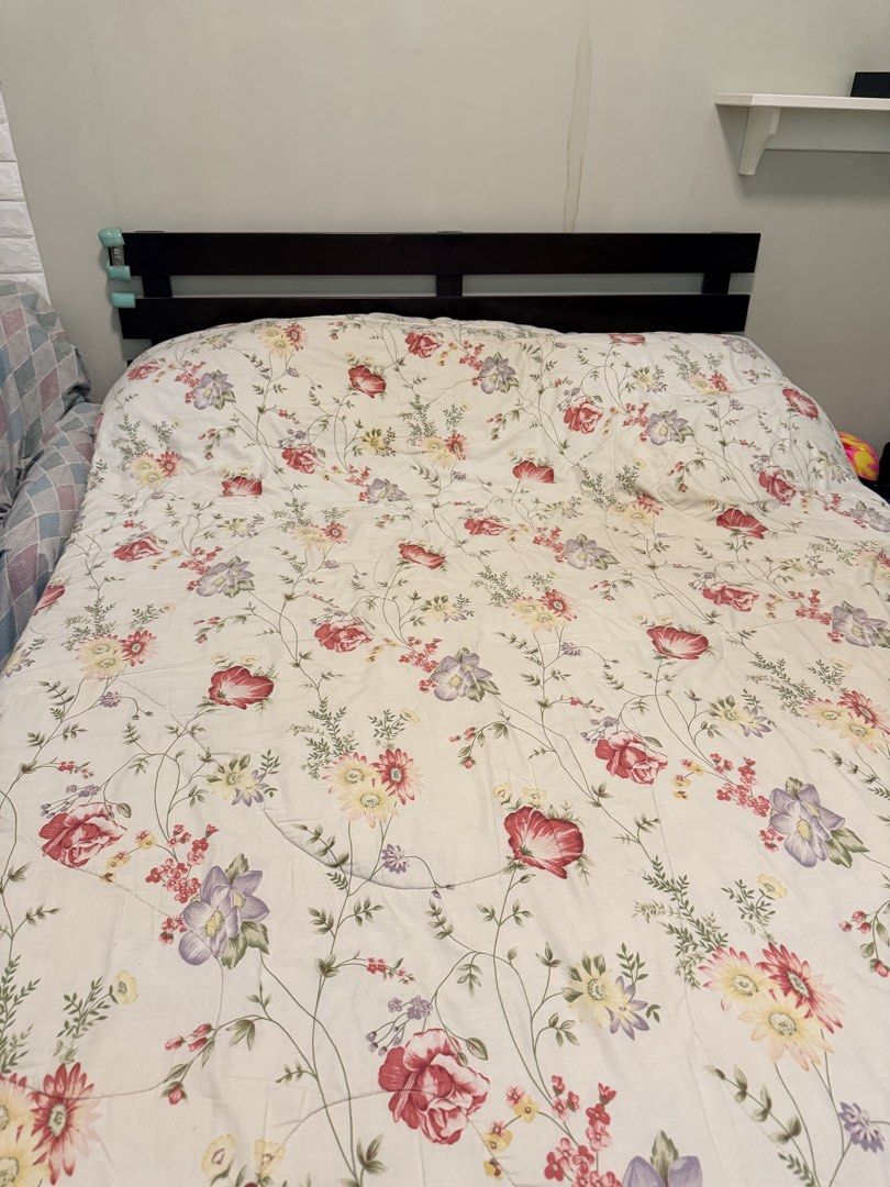 Queen size wooden bedframe (Category: Bedding & Towels) located in Pasig City. Submitted by mbbproperties (Listing ID 1431638157, Image 1). Description: Bed frame only - Queen size - Adds a decorative touch to your bedroom..