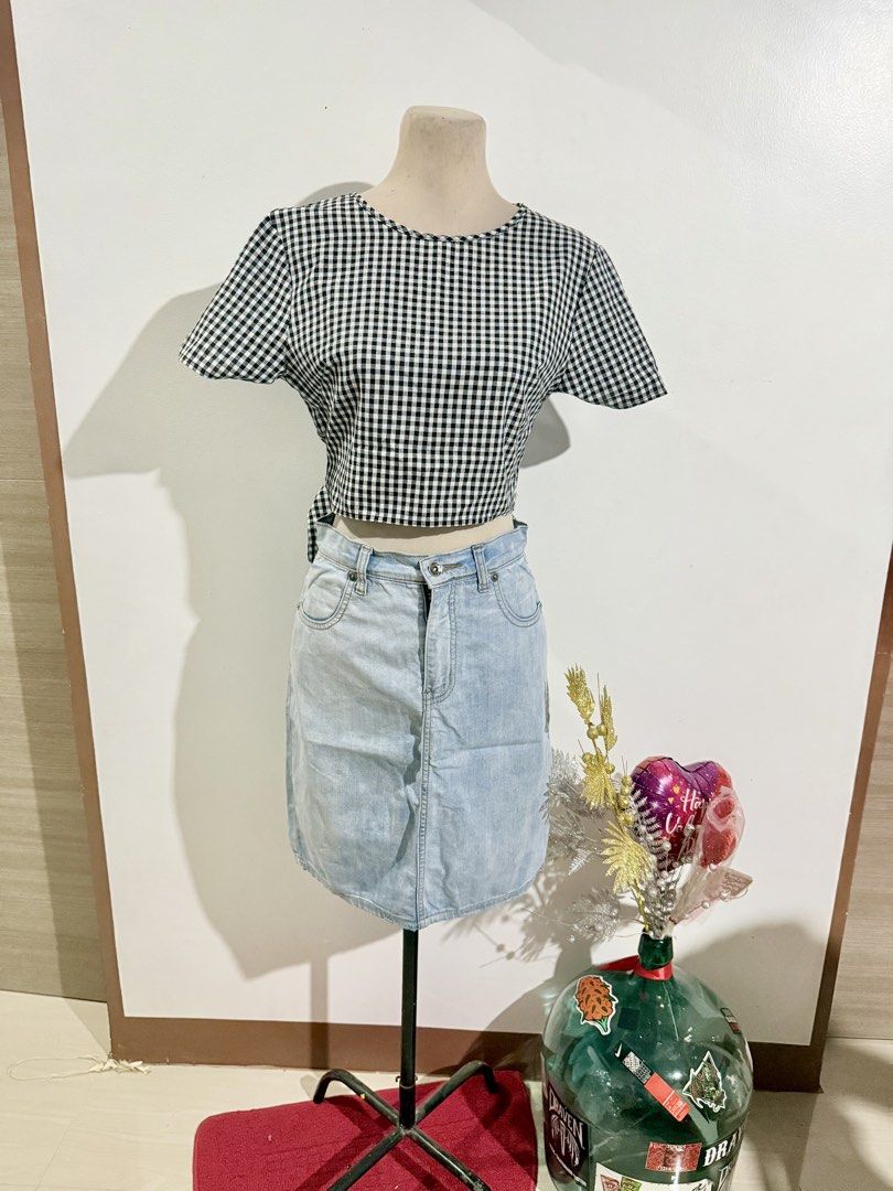 Gingham Crop Top (Category: Sets or Coordinates) located in Caloocan City. Submitted by dddddddddddeclutter (Listing ID 1431757816, Image 1). Description: - Two-piece set: gingham crop top and denim skirt. - Top: Black and white gingham, tie-back detail, short sleeves. - Skirt: Light wash denim, five-pocket design. - Versatile for casual and evening looks. - Easy to style..