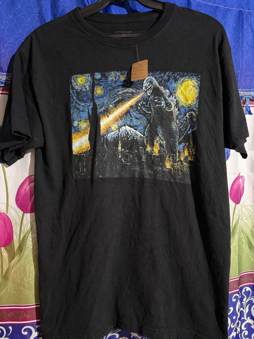 Godzilla Starry Night T-shirt - Medium (Category: Tshirts & Polo Shirts ) located in Santa Barbara. Submitted by pickersdelight (Listing ID 1431690825, Image 1). Description: Godzilla by Toho - Black Godzilla t-shirt - Unique design inspired by Van Gogh's "Starry Night" - Size: Medium Dimension: width: 21 inches length: 28 inches - Material: 100% cotton - Made in El Salvador - Care Instructions: - Machine wash cold with like colors - Non-chlorine