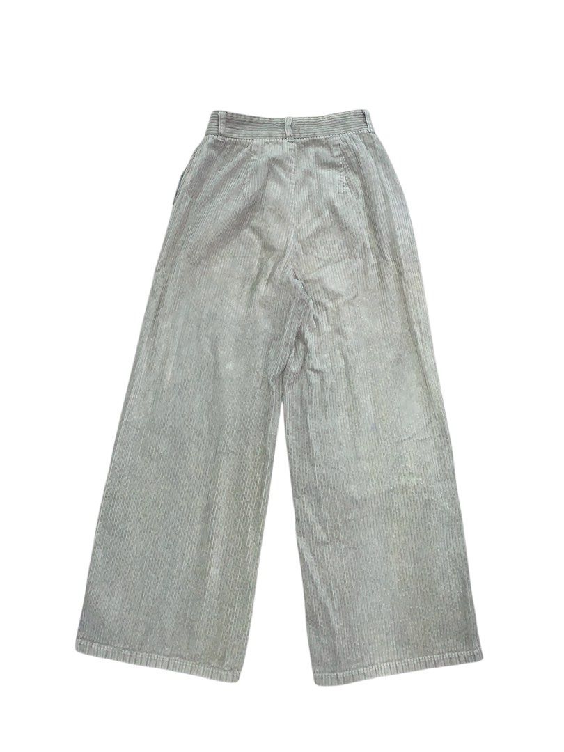 Gray Corduroy Wide Leg Pants (Category: Jeans) located in Mandaluyong City. Submitted by fayemaure (Listing ID 1431620463, Image 2). Description: - Light gray corduroy pants - Wide-leg design - Size: Waist-24”, Length-37”, Hips-34” - Features: Button closure, pockets - Condition: Visible stains present.