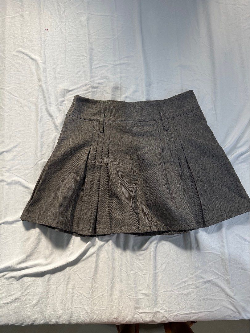 Gray Pleated Skort - Size L (Category: Skirts) located in Manila. Submitted by raphaelain17296 (Listing ID 1431735862, Image 2). Description: - Gray pleated SKORT - Size: L - Features: Tailored design, front pleats, button details - Fabric: Sturdy - Suitable for various occasions.