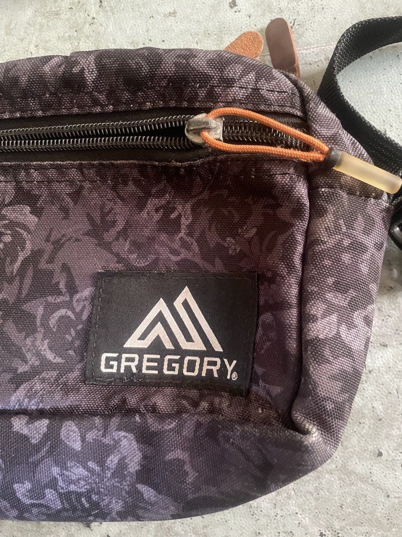 Gregory Crossbody Bag Floralgregory Print (Category: Cross-body Bags) located in Laguindingan. Submitted by kixseven (Listing ID 1431588596, Image 2). Description: - Floral print crossbody bag - Main compartment with zipper closure - Adjustable strap - Features the Gregory logo - Orange accent on zipper pull - NO COD ❌ - Location : Mindanao - Ship nationwide - MOP : gcash - With signs of use ( 2nd hand item ) - needs wash - Plus sf.