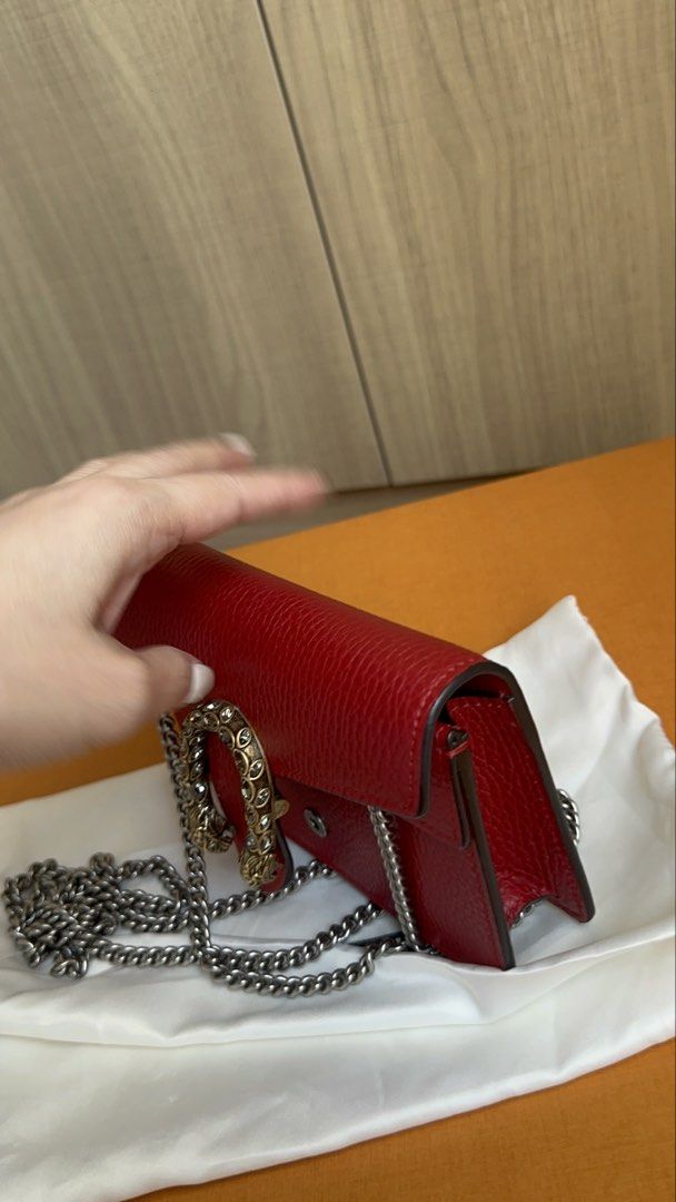 Gucci Dionysus Super Mini Bag Red (Category: Luxury Bags & Wallets) located in Manila. Submitted by ckaicee9249143 (Listing ID 1431733085, Image 2). Description: - Gucci Dionysus Super Mini Bag - Red leather exterior - Chain strap - Iconic tiger head closure - Silver-toned hardware - Includes dust bag - Compact size, perfect for essentials once Lang din siya nagamit like new pa siya Can go with Rank SA OR LOOK BRANDNEW MEET UP AT JAZZ MALL MAKATI