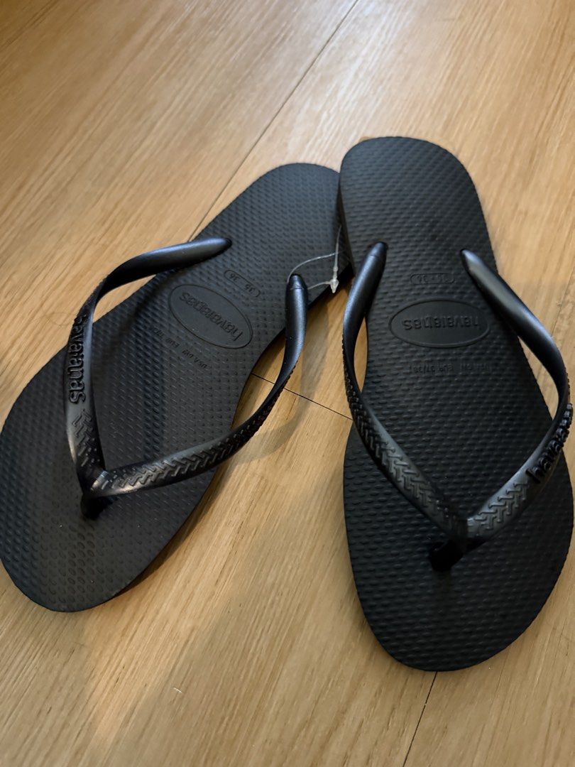 Havaianas Black Flip-Flops (Category: Slippers and slides) located in Manila. Submitted by thisandthatpreloved (Listing ID 1431726766, Image 2). Description: - Classic black Havaianas flip-flops - Features the iconic Havaianas logo - Textured footbed for added grip - Comfortable for everyday wear - Includes original tag - Size: 35-36 - LFS: Bought the wrong size.