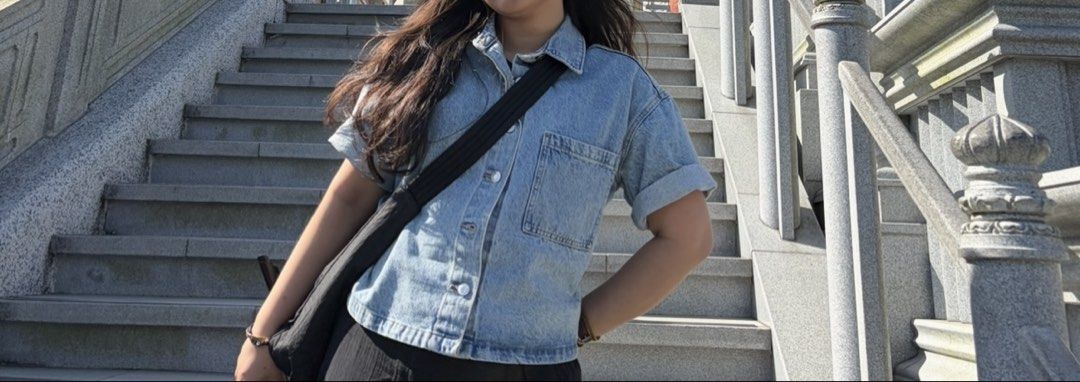 H&M Denim Short Sleeve Shirt (Category: Shirts) located in Pasig City. Submitted by jasalec (Listing ID 1431697517, Image 3). Description: - H&M denim shirt - Light blue wash - Short sleeves - Relaxed fit - Classic collar and button-down closure - Single chest pocket - Versatile for layering or wearing alone Original price is 1490. Selling it for 1200 since I only wear this once on hk. .