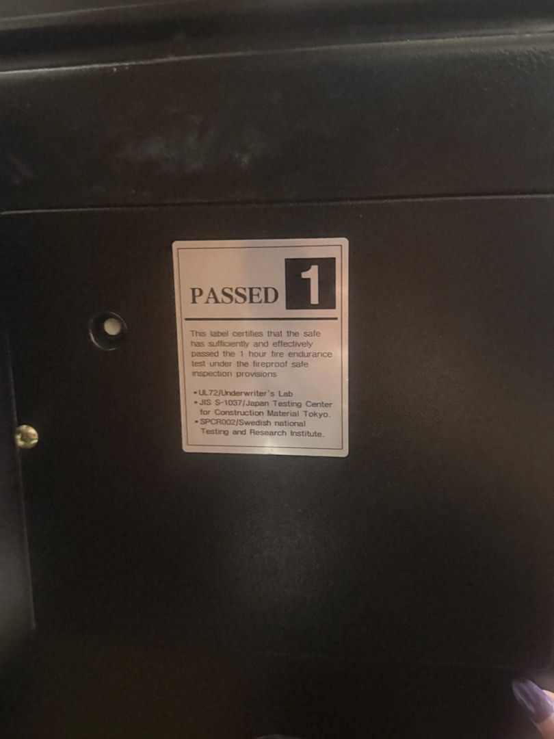 Honeywell Digital Safe (Category: Safe) located in Taguig. Submitted by che_f25 (Listing ID 1431598641, Image 3). Description: - Honeywell digital safe - Key access and digital keypad - Includes key and round cover - Black exterior, silver handle - Fireproof design - "PASSED 1" label PS: need lang paayos yung Digital para gumana..