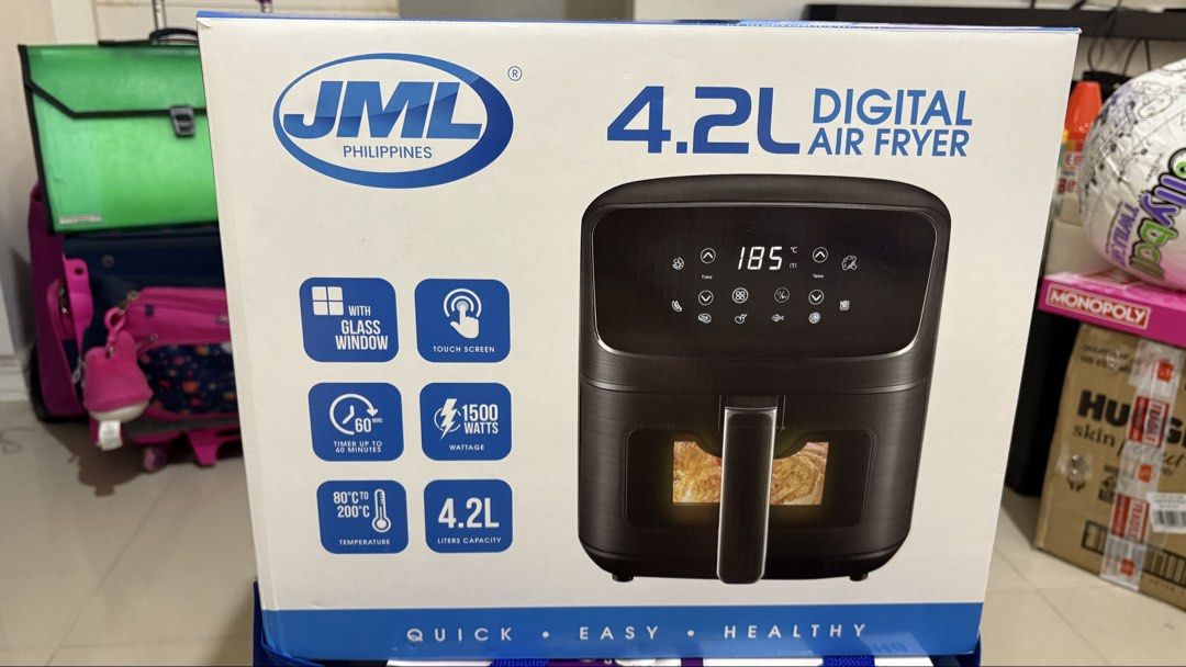 JML 4.2L Digital Air Fryer (Category: Fryers) located in Antipolo. Submitted by msjavier (Listing ID 1431628172, Image 2). Description: - JML 4.2L Digital Air Fryer - 1500W heating - Touch screen control - See-through glass window - 8 preset cooking modes - Timer up to 60 minutes - Includes non-stick pan, rack, and recipe book - Temperature range: 80°C - 200°C.