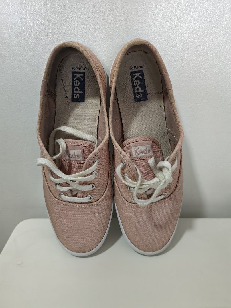 Keds Women's Sneakers (Category: Sneakers) located in Pasay City. Submitted by meimeitoot (Listing ID 1431577378, Image 2). Description: - Soft pink Keds sneakers - US 6.5, UK 37, 23.5 cm - White laces and soles - Classic, casual design - Some wear on soles - Features Keds logo on inner soles - Perfect for everyday wear.