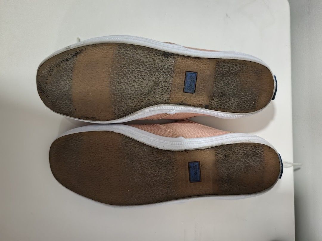 Keds Women's Sneakers (Category: Sneakers) located in Pasay City. Submitted by meimeitoot (Listing ID 1431577378, Image 3). Description: - Soft pink Keds sneakers - US 6.5, UK 37, 23.5 cm - White laces and soles - Classic, casual design - Some wear on soles - Features Keds logo on inner soles - Perfect for everyday wear.