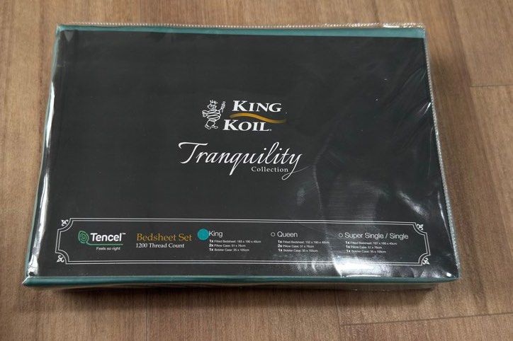 King Koil Tranquility Tencel Bed Sheet Set (Category: Bedding & Towels) located in Singapore. Submitted by smiling_216 (Listing ID 1431660852, Image 1). Description: - Brand new King Koil Tranquility Tencel bedsheet set. - King size. - Made from soft and breathable Tencel. - Still in original packaging..
