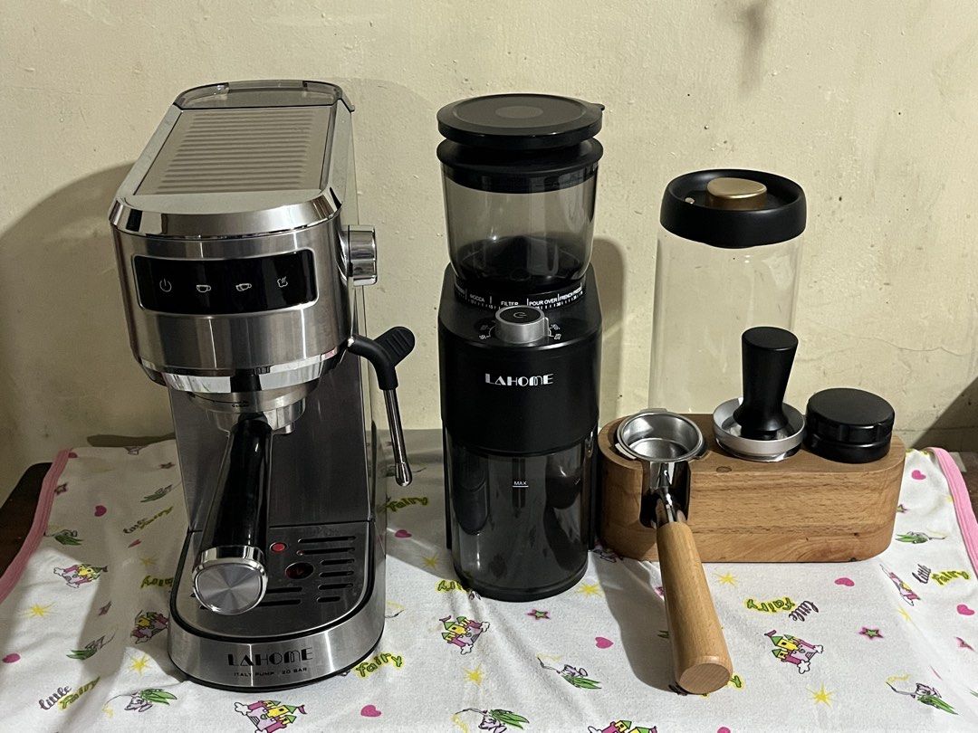 LaHome Espresso Machine and Grinder Set (Category: Coffee Machines & Makers) located in Pandi. Submitted by gastospamore (Listing ID 1431580070, Image 1). Description: - LaHome espresso machine set - Includes: Espresso machine, coffee grinder, portafilter, tamper, and accessories - Espresso machine: Stainless steel finish - Grinder: Black - Well-maintained condition - Ready for immediate use - Perfect for home coffee brewing/starting coffee shops