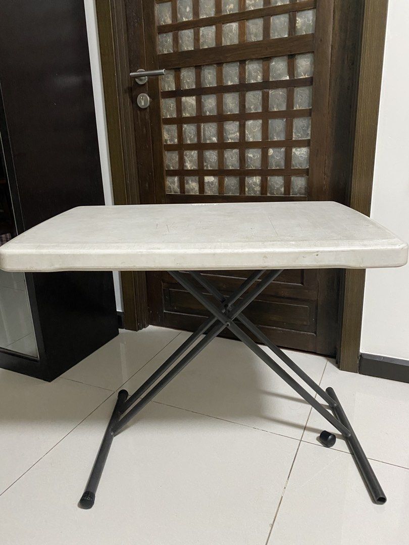 Lifetime Folding Table (Category: Tables & Sets) located in Quezon City. Submitted by waytodeclutter (Listing ID 1431692699, Image 1). Description: - Lifetime folding table - White rectangular tabletop - Black metal legs - Folds for easy storage - Portable and easy to transport - Sturdy and stable design - Ideal for workspace or small dining table.