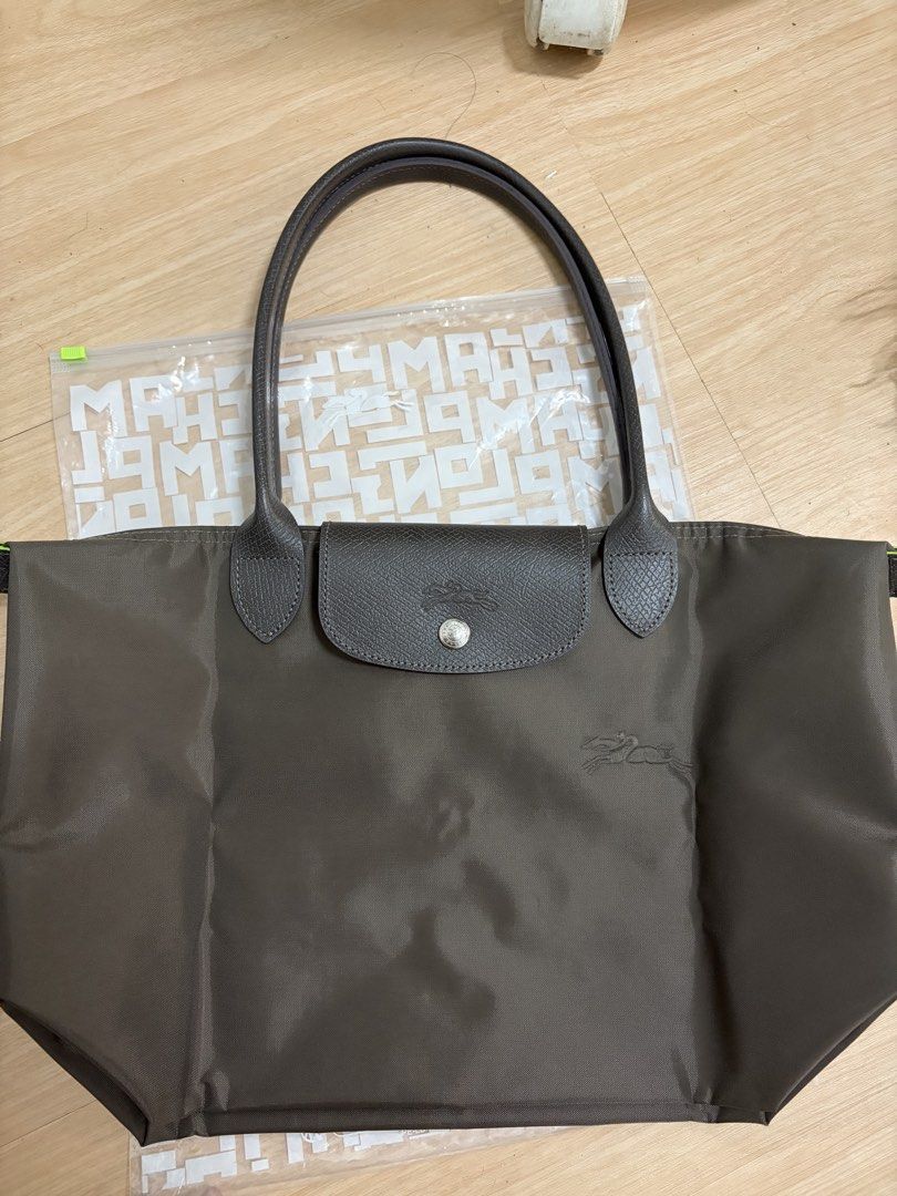 Longchamp Le Pliage Terra Medium Long Handle (Category: Luxury Bags & Wallets) located in Manila. Submitted by lovedtwice.ph (Listing ID 1431672614, Image 2). Description: Guaranteed original See photos for details of the bag No flaws or signs of usage LAST PRICE..