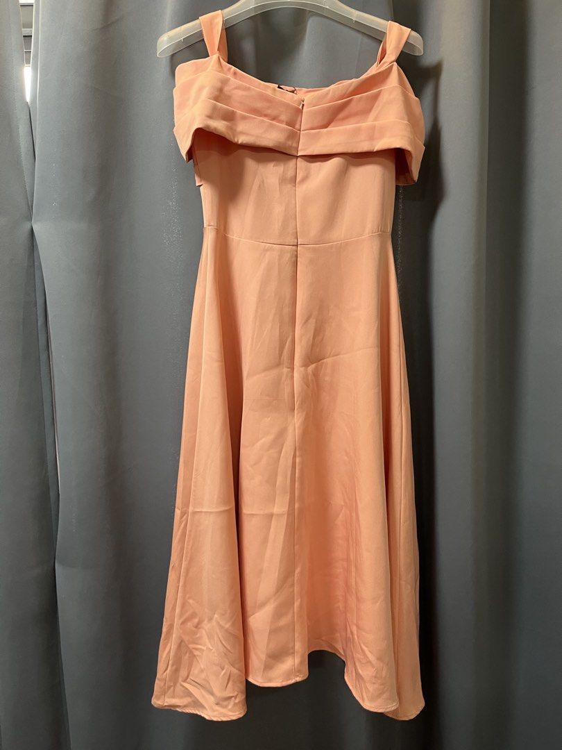 Mags Off-Shoulder Dress - Size S (Category: Dresses) located in Quezon City. Submitted by purunts (Listing ID 1431627030, Image 2). Description: - Mags off-shoulder dress - Soft peach color - Size small - A-line silhouette - Back zipper closure - Perfect for special occasions - Brand new with tag.