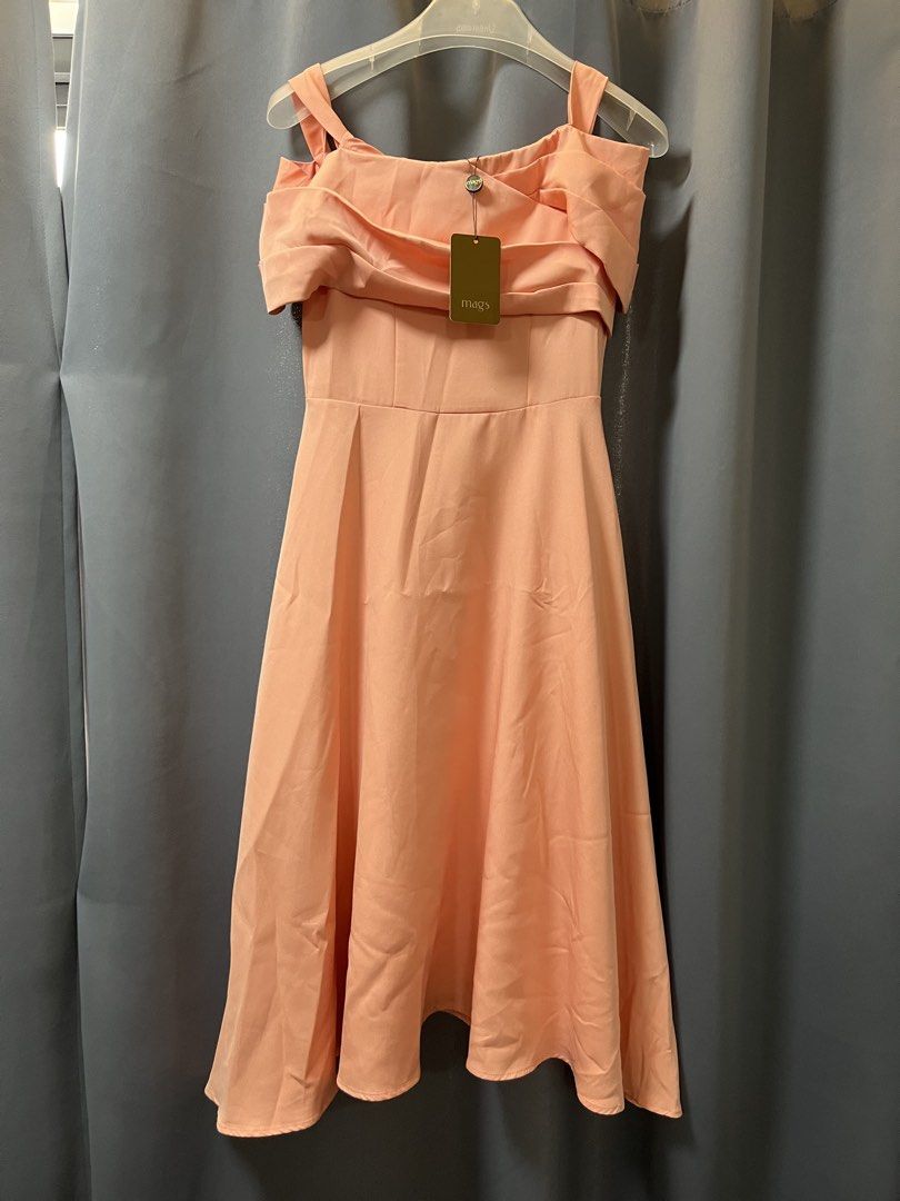 Mags Off-Shoulder Dress - Size S (Category: Dresses) located in Quezon City. Submitted by purunts (Listing ID 1431627030, Image 1). Description: - Mags off-shoulder dress - Soft peach color - Size small - A-line silhouette - Back zipper closure - Perfect for special occasions - Brand new with tag.