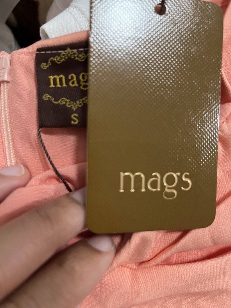 Mags Off-Shoulder Dress - Size S (Category: Dresses) located in Quezon City. Submitted by purunts (Listing ID 1431627030, Image 3). Description: - Mags off-shoulder dress - Soft peach color - Size small - A-line silhouette - Back zipper closure - Perfect for special occasions - Brand new with tag.