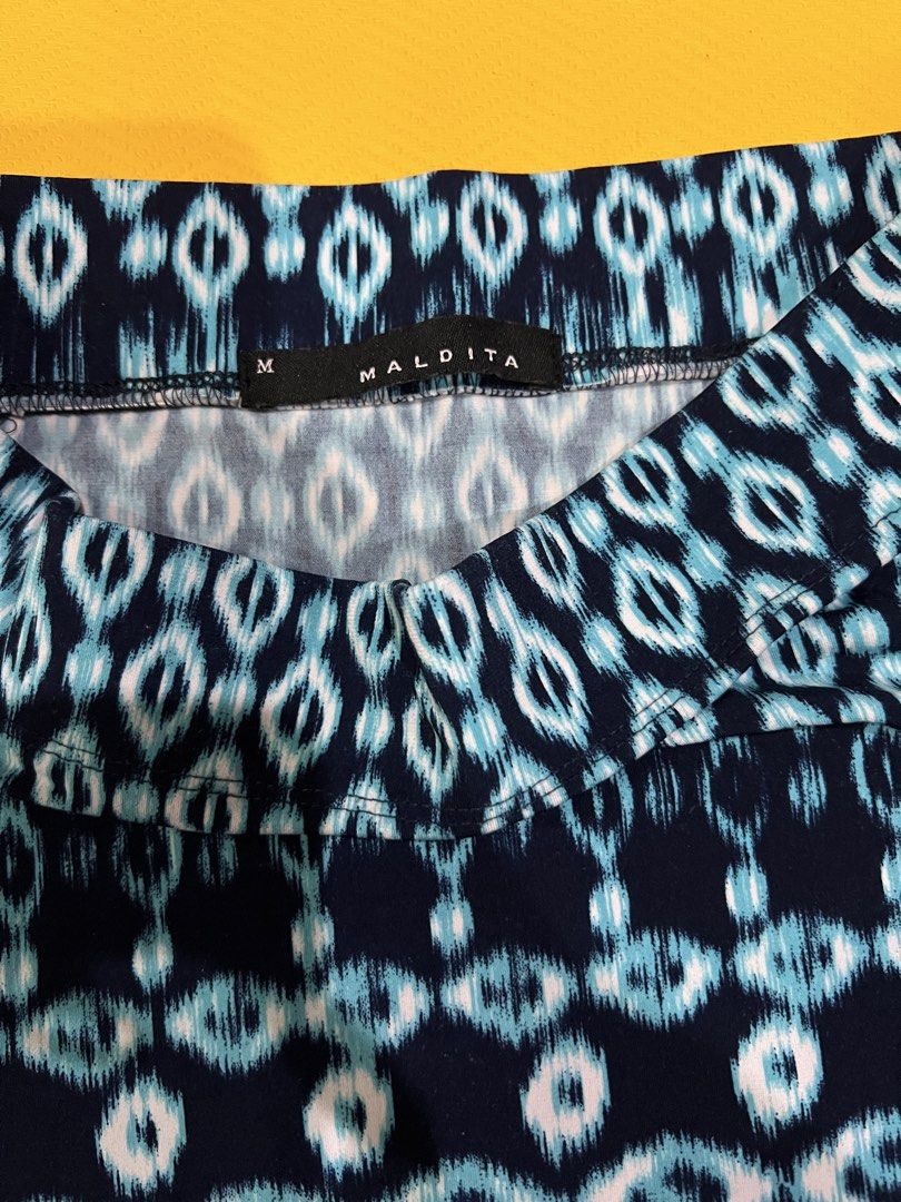 Maldita Bodycon Skirt (Category: Skirts) located in Quezon City. Submitted by mombie888 (Listing ID 1431621100, Image 2). Description: - Maldita bodycon skirt - Features a vibrant blue and white geometric pattern - Fitted silhouette - Comfortable waistband - Versatile for casual and dressier occasions - used less than 5x - SRP: 1000 Payment: Gcash or BPI only Shipping: fee c/o buyer. Grab or Lalamove only. QC location. .