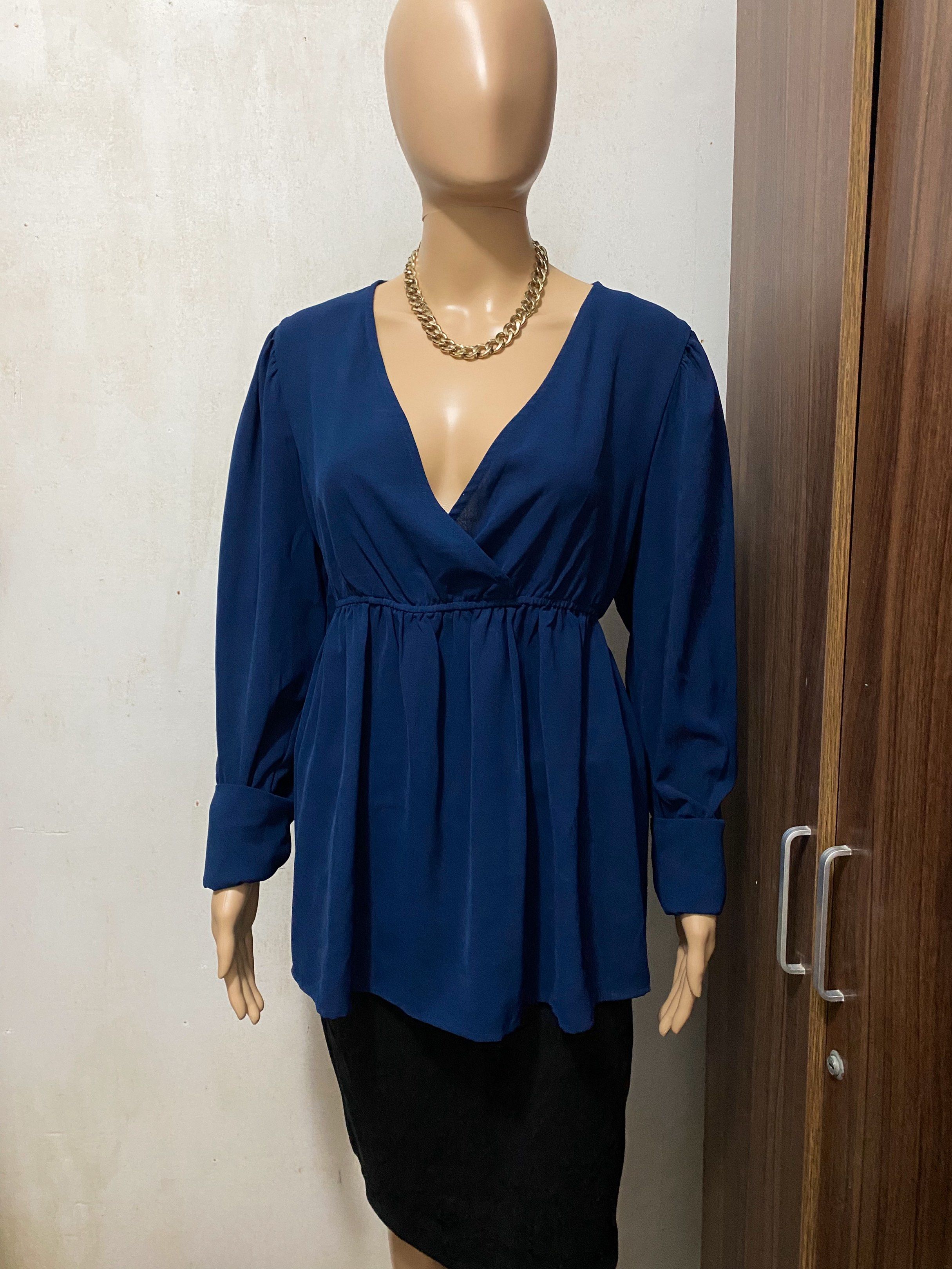 Maternity Peplum Longsleeve Blouse (Dark Blue) (Category: Blouses) located in Manila. Submitted by passmystyle (Listing ID 1431723445, Image 1). Description: •Large •Dark Blue •Mas maluwag ng slight yung garter ng right sleeve around the wrist.