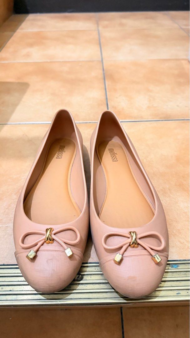 Melissa Flats with Bow Detail (Category: Flats & Sandals) located in Makati City. Submitted by assorted_items88 (Listing ID 1431579732, Image 2). Description: ✨ Size 35/36 ONLY – for small feet Original Melissa flats in nude pink with bow detail. • Size: 35/36 • Condition: Well used • Purchased at ₱3,490 • With visible signs of use but still functional • No box Lightweight, comfy, and perfect for everyday wear. .