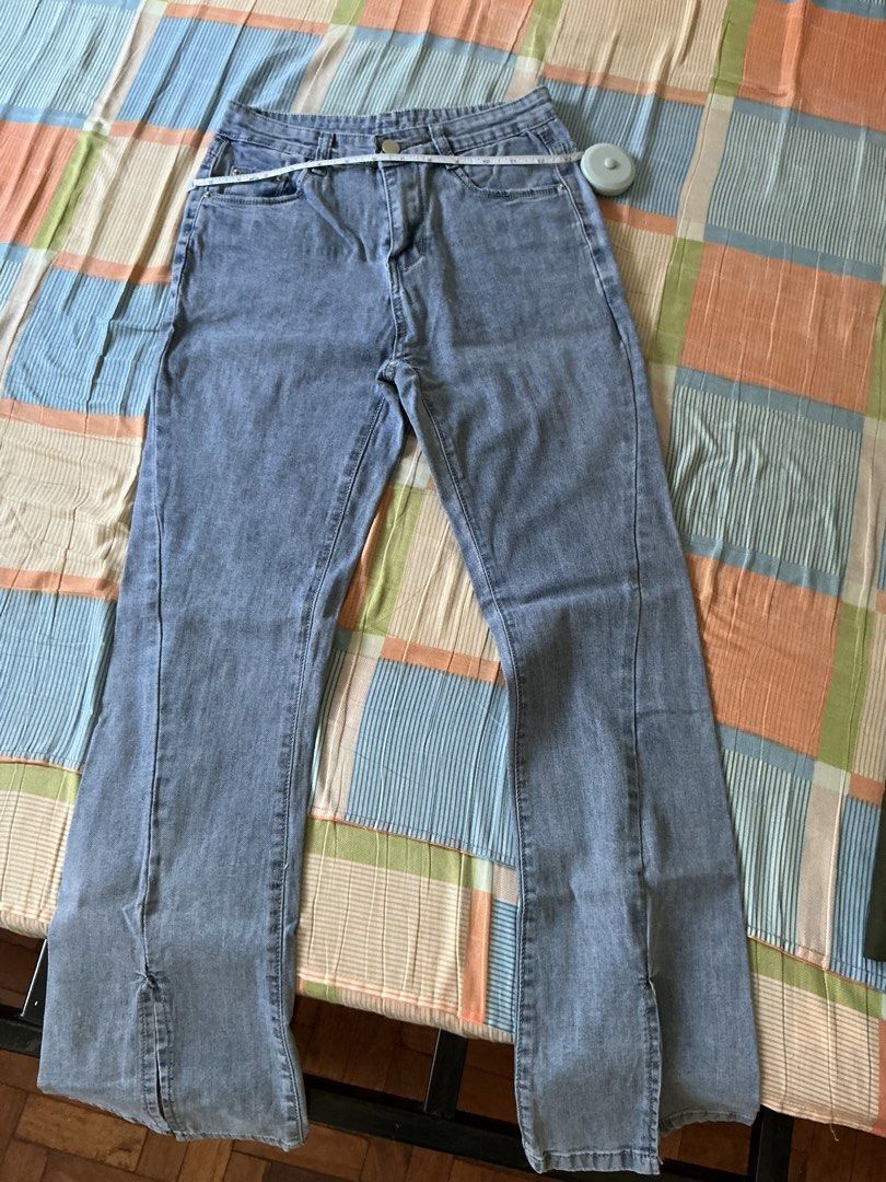 Micro Flared Sky Blue Denim Pants Split Leg Skinny Stretchy Jeans (Category: Jeans) located in Capas. Submitted by aaaaaaaaaaa_ (Listing ID 1431598643, Image 1). Description: - Light wash denim jeans - Slit hem design - Button and zipper closure - Straight leg fit - Waist: Approximately 14 inches.