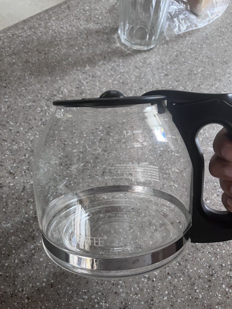 Mr Coffee Replacement Glass carafe (Category: Coffee Machines & Makers) located in Mandaluyong City. Submitted by goodfair (Listing ID 1431615416, Image 3). Description: This item is a Mr. Coffee 12-Cup Replacement Glass Carafe, model PLD12-RB, featuring a black handle and a generous 12-cup capacity. Ships from Mandaluyong.