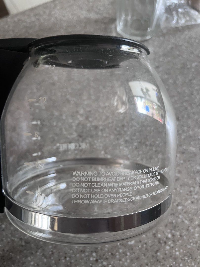 Mr Coffee Replacement Glass carafe (Category: Coffee Machines & Makers) located in Mandaluyong City. Submitted by goodfair (Listing ID 1431615416, Image 2). Description: This item is a Mr. Coffee 12-Cup Replacement Glass Carafe, model PLD12-RB, featuring a black handle and a generous 12-cup capacity. Ships from Mandaluyong.