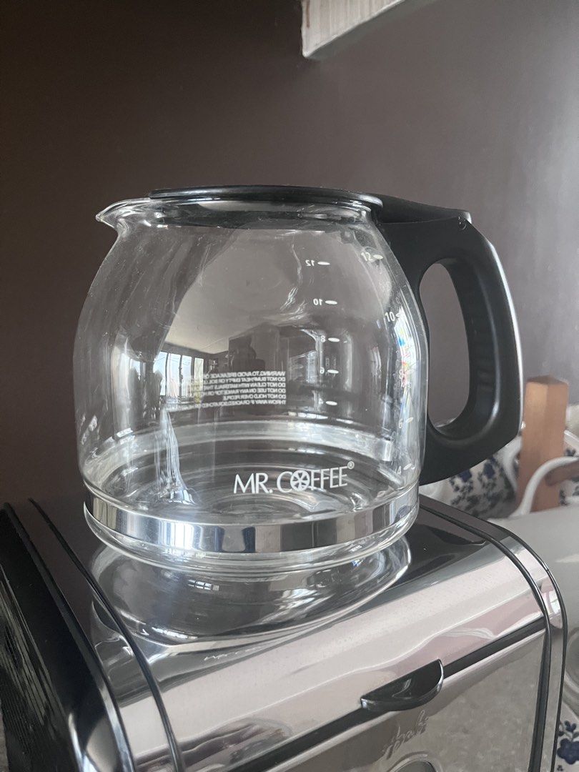 Mr Coffee Replacement Glass carafe (Category: Coffee Machines & Makers) located in Mandaluyong City. Submitted by goodfair (Listing ID 1431615416, Image 1). Description: This item is a Mr. Coffee 12-Cup Replacement Glass Carafe, model PLD12-RB, featuring a black handle and a generous 12-cup capacity. Ships from Mandaluyong.