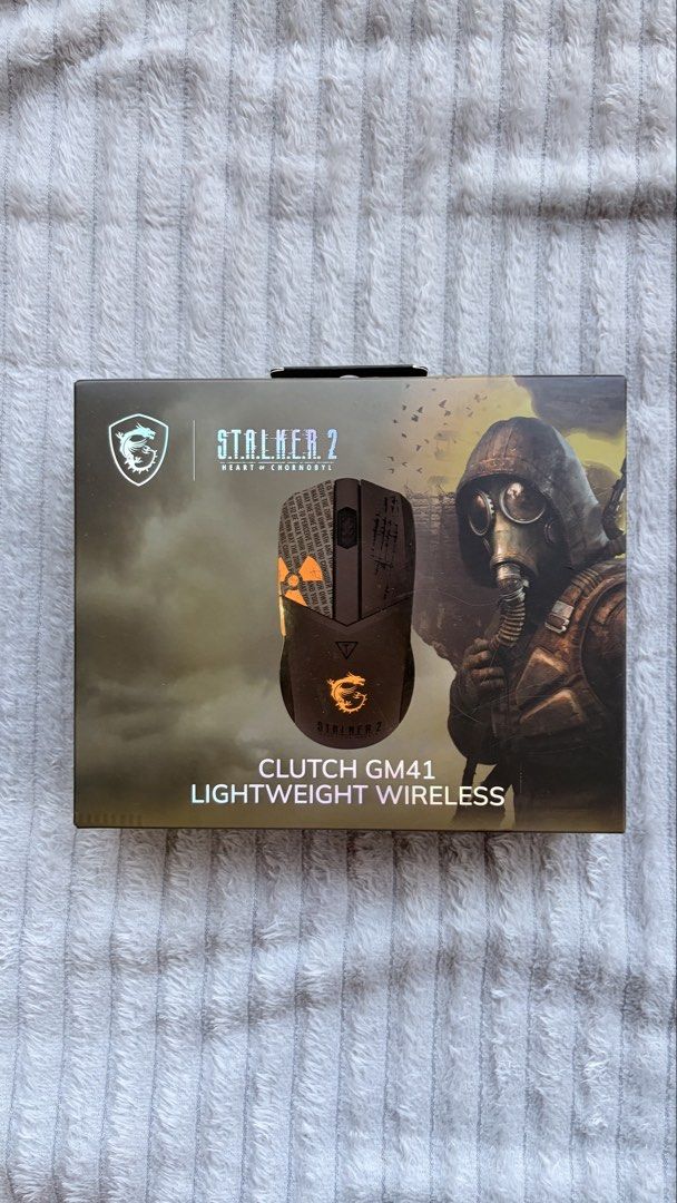 MSI Clutch GM41 Lightweight Wireless Mouse (STALKER 2 Edition) (Category: Mouse & Mousepads) located in Manila. Submitted by arghelicuh (Listing ID 1431675038, Image 1). Description: - MSI Clutch GM41 Lightweight Wireless Mouse - Stalker 2 Theme - Ultra-lightweight design - 60+ million Omron switches - PAW-3370 optical sensor for precise tracking - Up to 80 hours of battery life on a single charge.