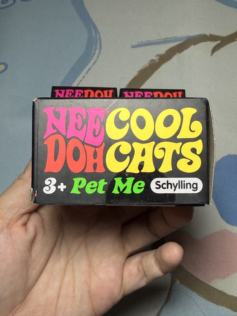 NeeDoh Cool Cats Stress Ball (Category: Kids Toys) located in Davao. Submitted by maezes.online.store (Listing ID 1431720479, Image 3). Description: - NeeDoh Cool Cats stress ball - Cat-shaped design - Filled with a squishy gel - Suitable for ages 3+ - Made by Schylling - 'Purrfect Way to Mellow Out!'.