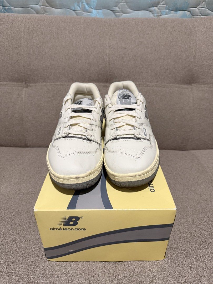 New Balance 550 Aimé Leon Dore (Category: Sneakers) located in Manila. Submitted by narm_711 (Listing ID 1431689250, Image 3). Description: - New Balance 550 sneakers, collaboration with Aimé Leon Dore. - Color: Cream and Grey. - Size: US 8.5 - Includes original box. - Features New Balance logo on the side. - Aimé Leon Dore logo on the heel..