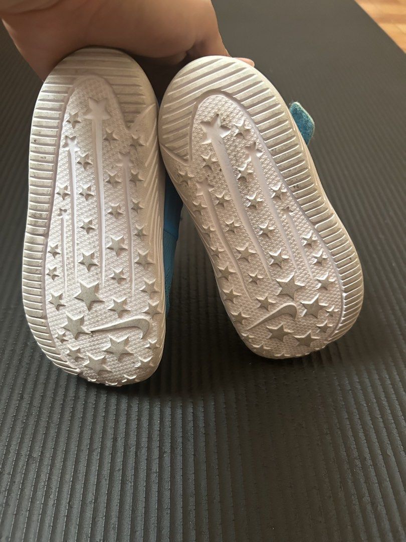 Nike Toddler Shoes Size 7C (Category: Babies & Kids Fashion) located in Taguig. Submitted by shepai (Listing ID 1431586244, Image 2). Description: - Blue Nike toddler shoes - Size: 7C - Easy on/off hook-and-loop strap - Sole design: Star pattern - Made in Vietnam - Condition: Good.