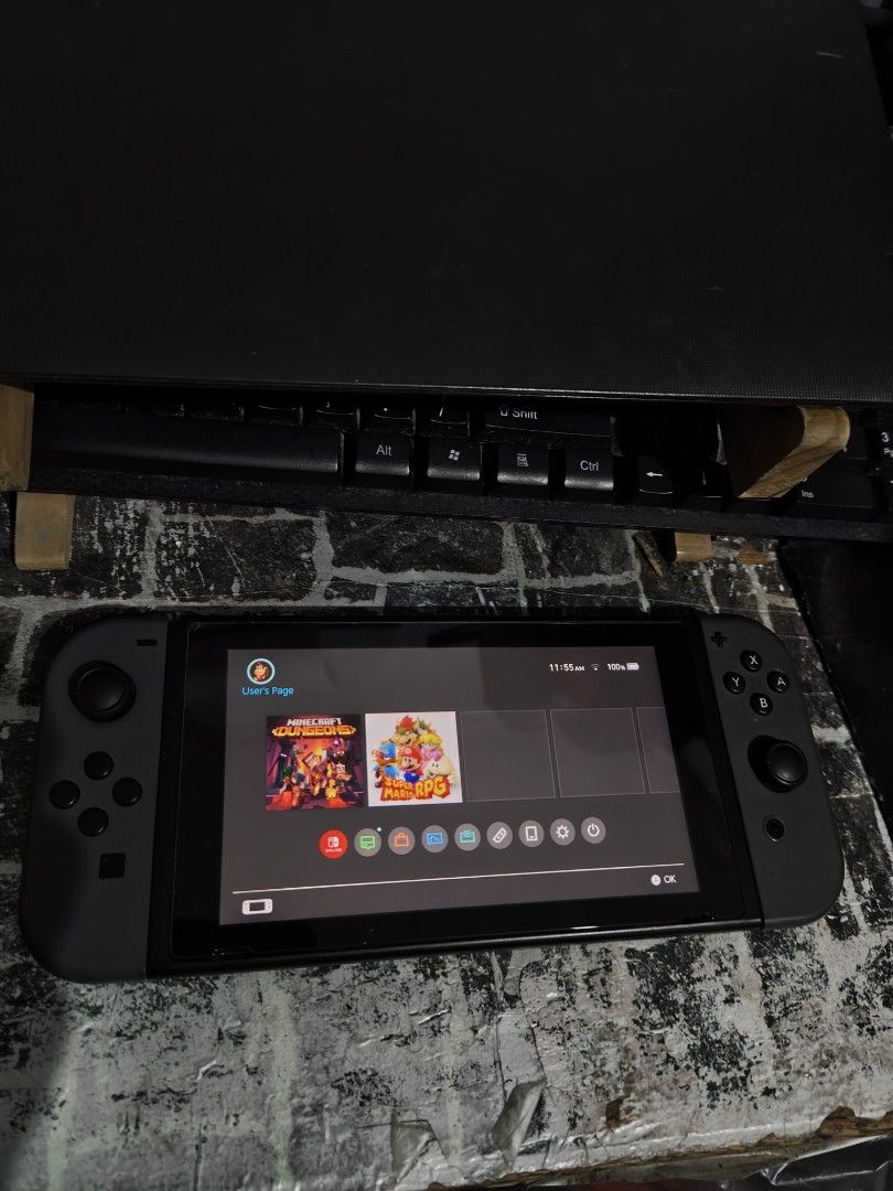 Nintendo Switch Console V1 (Category: Nintendo) located in Calamba. Submitted by teryroger23 (Listing ID 1431592862, Image 1). Description: - Nintendo Switch console included - Comes with a pair of Joy-Con controllers (STILL IN GOOD CONDITION) - Includes original charger - Console color: Black and gray - Includes 32GB SD CARD - With hard case pouch (can provide photos if asked) - No dock and hdmi cable.