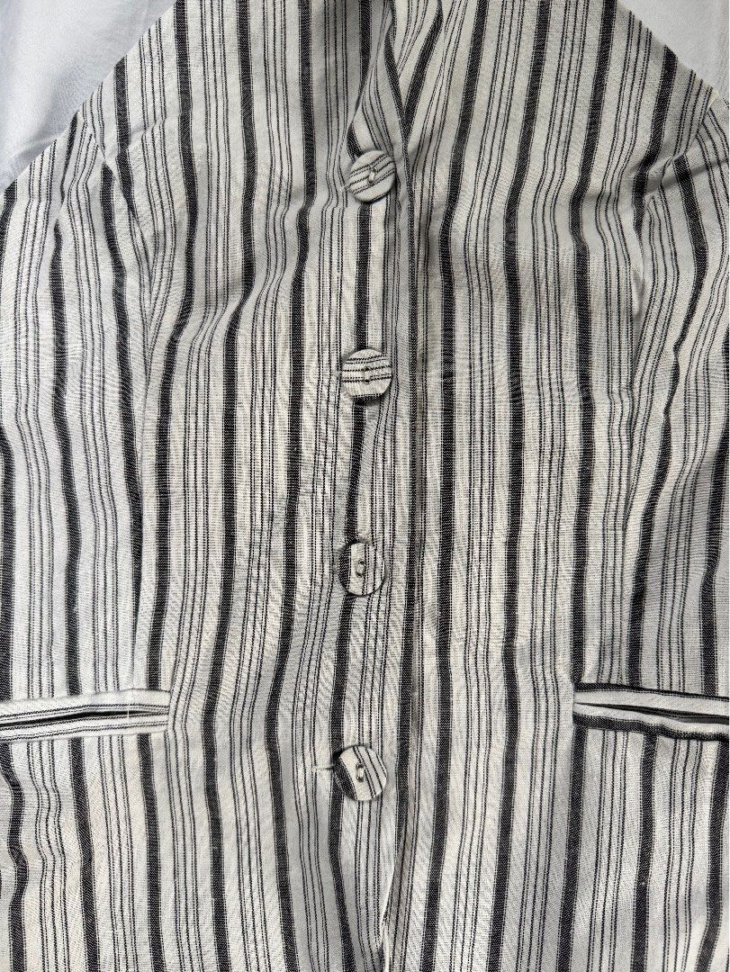 NÖSTA Striped Button-Up Top (Category: Blouses) located in Manila. Submitted by raphaelain17296 (Listing ID 1431730956, Image 2). Description: ✨ FOR SALE ✨ ✔️ Linen material ✔️ Button front design ✔️ Adjustable tie back ✔️ Size L Selling because it’s too big for me now after losing weight. Great condition — perfect for casual or chic outfits 💯 Message me if interest.