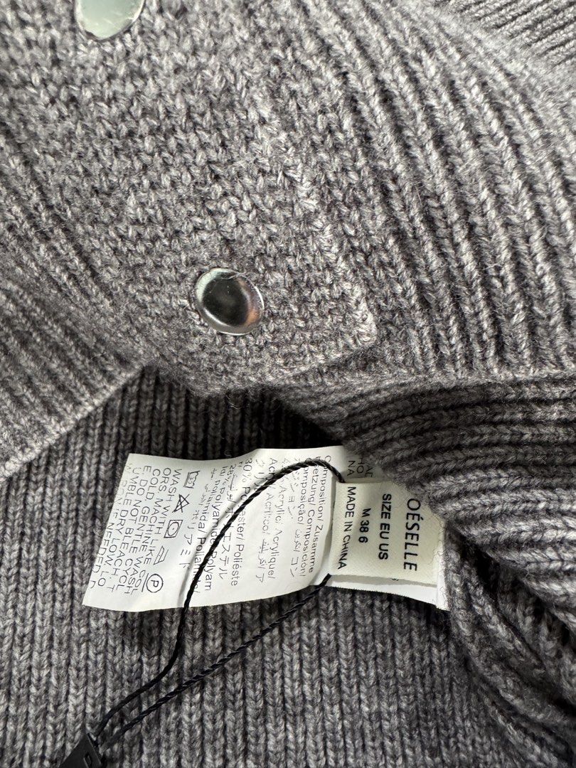OESELLE Cardigan - Size M (Category: Coats, Jackets and Outerwear) located in Manila. Submitted by raphaelain17296 (Listing ID 1431730259, Image 2). Description: - OESELLE Cardigan - Size: M - Color: Grey - Features: Button-down front, long sleeves, ribbed cuffs - Made in China - Stylish and versatile.