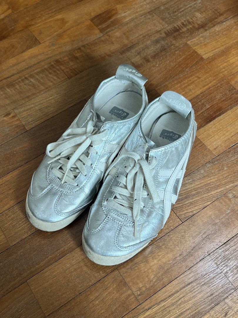 ONITSUKA TIGER Mexico 66 Silver Sneakers (Category: Sneakers) located in Singapore. Submitted by nxtxlie_ (Listing ID 1431653792, Image 3). Description: Size EU 37.5/ US 5/ 23.5CM RTP: $190 Well worn, condition is as shown in the pictures. Dm me for more pictures of the condition of the shoes :) .