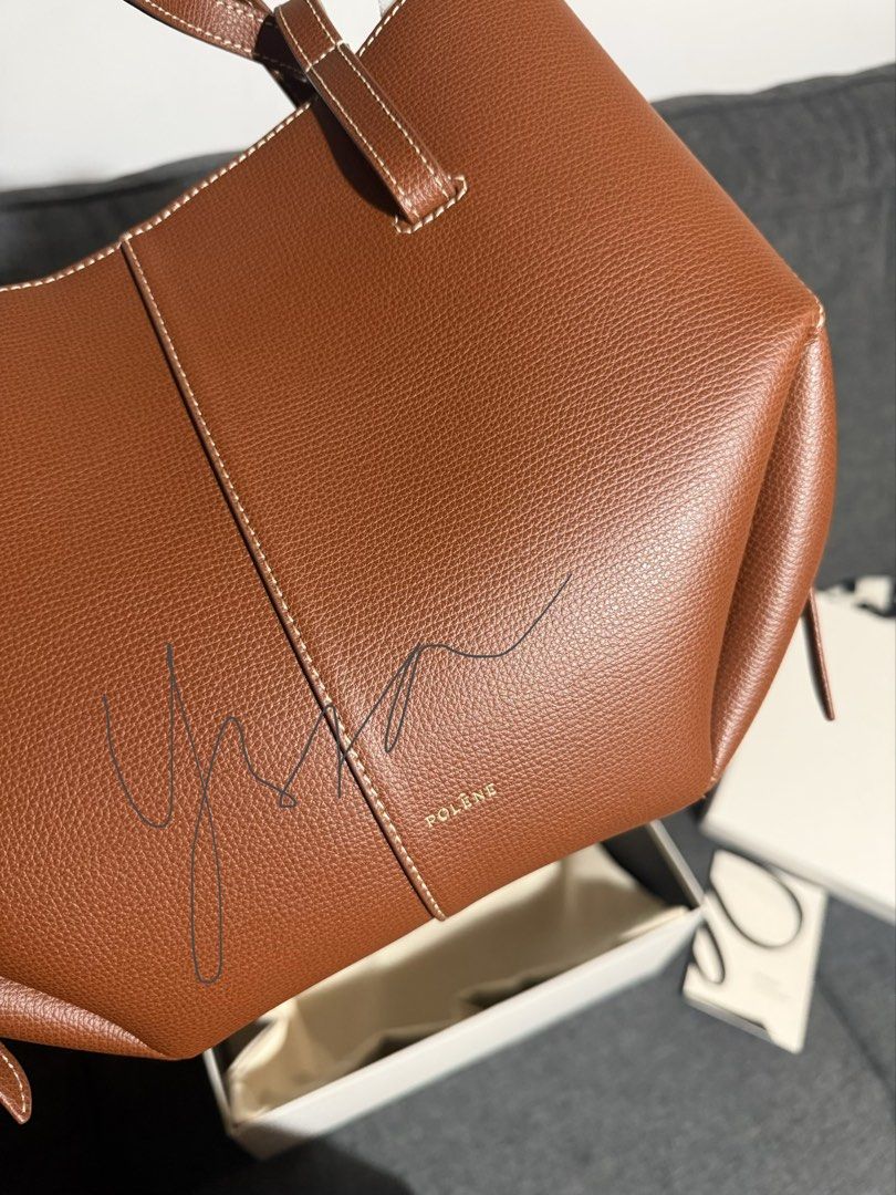 Polène Cyme Mini Handbag (Category: Luxury Bags & Wallets) located in Makati City. Submitted by YssabelleYap (Listing ID 1431604329, Image 1). Description: - Polène Cyme Mini handbag - Color: Cognac - Style: Structured, top handle - Condition: Excellent - Includes: Original packaging and card.