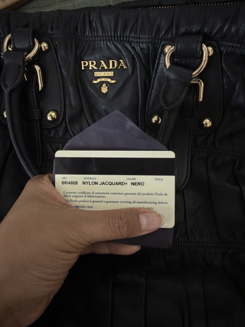 Prada Jacquard (Category: Luxury Bags & Wallets) located in Quezon City. Submitted by egptasiaco (Listing ID 1431682231, Image 3). Description: Selling my bag With authenticity card Money back guaranteed if proven fake All gold hard wares and good condition.